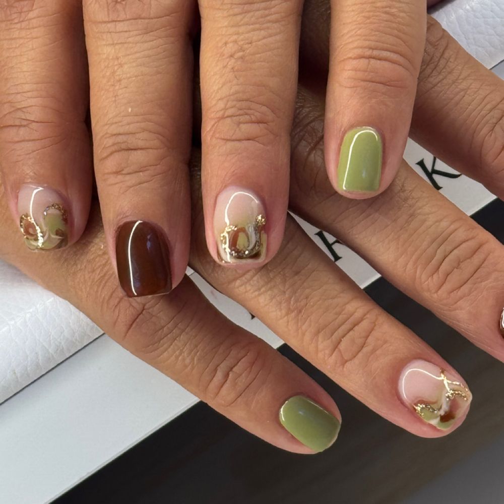 Green and gold nail art